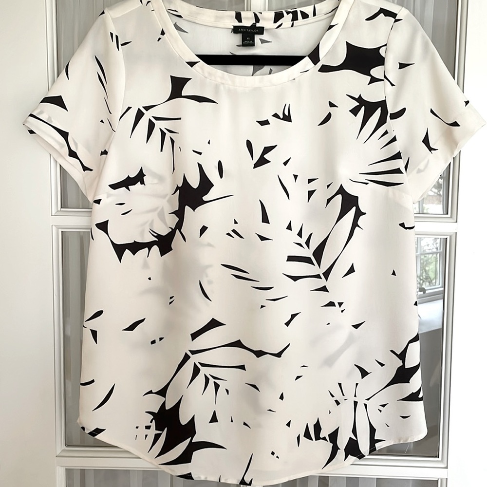 white with abstract black print, short sleeve blouse